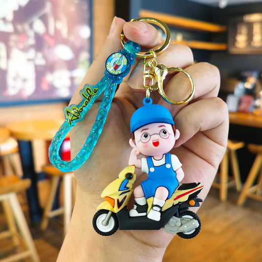 Cartoon Guy with Scooter Keychain